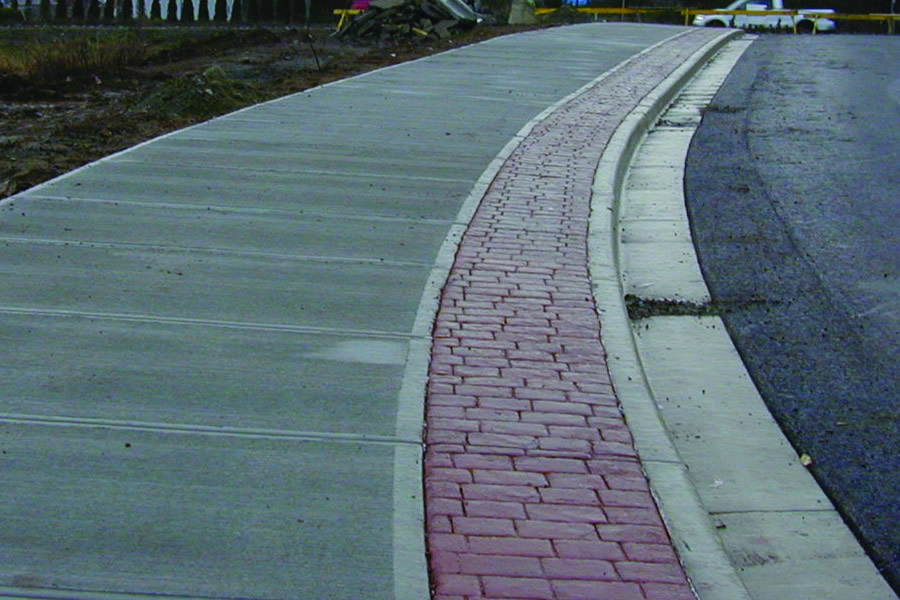 Niko Projects concrete curbs and sidewalks with stamped concrete